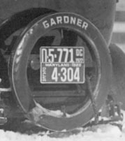 Washington, D.C. (top) and Maryland dealer plates for 1922 attached to a Gardner touring car being demonstrated in deep snow on the Mall