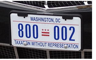 White House fleet plate on the front of the presidential limousine used in the 2013 inaugural parade.