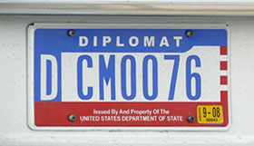 1984 base flat OFM Diplomatic license plate. To which country CM-series numbers are assigned is unknown.