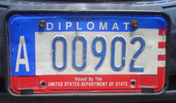 1984 base OFM Diplomat license plate, embossed style, no. A 00902, issued to a representative of the Organization of American States