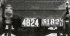 Close image of license plates from scene above.