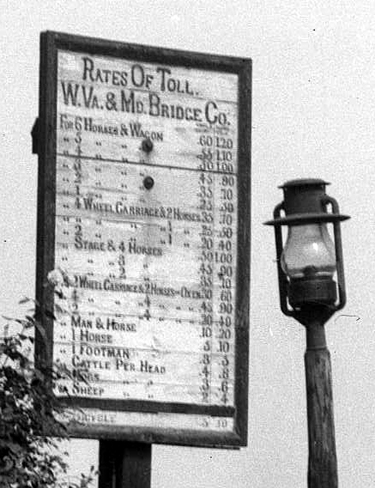 Toll schedule posted at a Potomac River bridge, Sept. 1910.