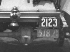 Close image of license plates from scene above.