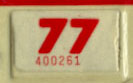 1976 (exp. 3-31-77) sticker, red on white