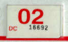2001 (expires 2002) sticker, red on white