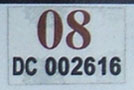 2008 sticker, brown on white